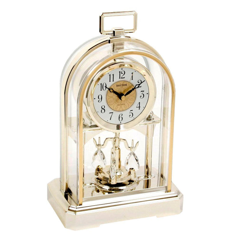 Rhythm Cont Mantel Clock Gilt Arch Anivers Sty Oblong Handle