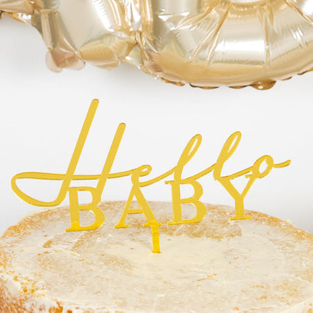 Baby shower cake toppers saying hello baby. We also have baby shower games UK